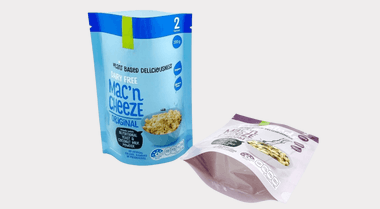 Front-facing round-bottom recyclable Doypack with zipper, matte finish, standing on a light shelf