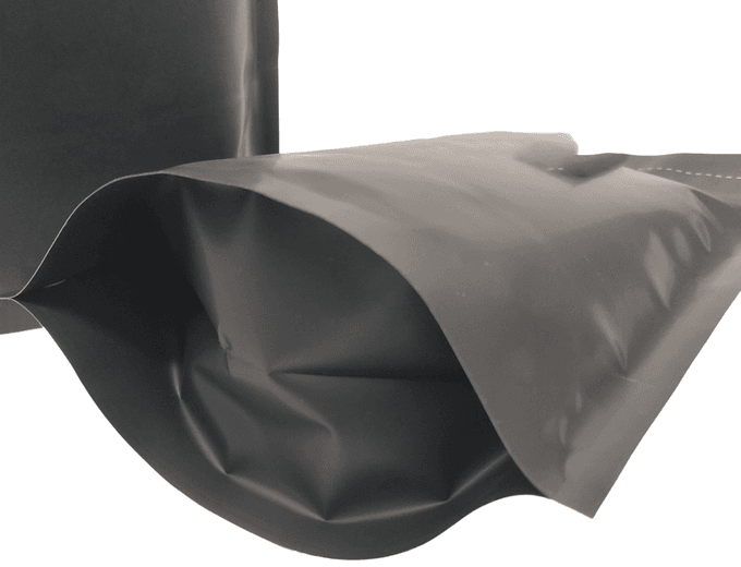 Macro close-up of a PE-compatible press-to-close zipper welded to a Mono-PE pouch wall with degassing valve inset