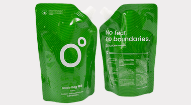 Recyclable spouted stand up refill pouch with corner spout pouring demonstration for cosmetic eco-refills