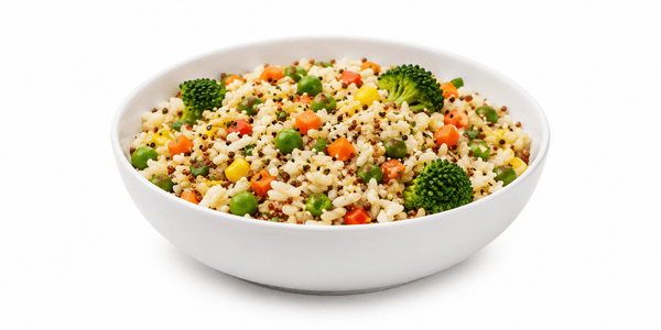 Stand-up microwaveable rice pouch beside a bowl of cooked rice