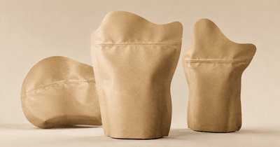Stand-up kraft pouch with bottle-silhouette die-cut, degassing valve, and resealable zipper